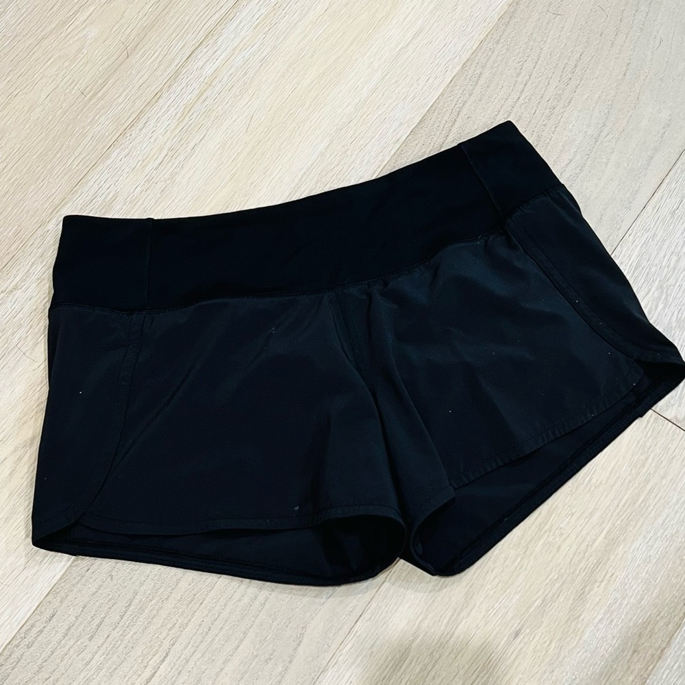 Black Speed Up Mid-Rise Lined Short 4". Gentle worn in a non-smoking home.